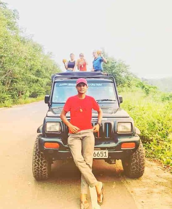 people posing for a photo after a safari.