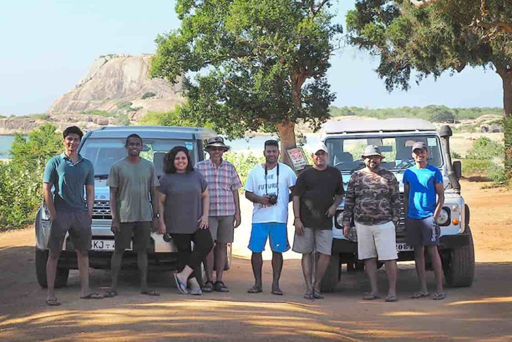 People posing for a photo after safari.